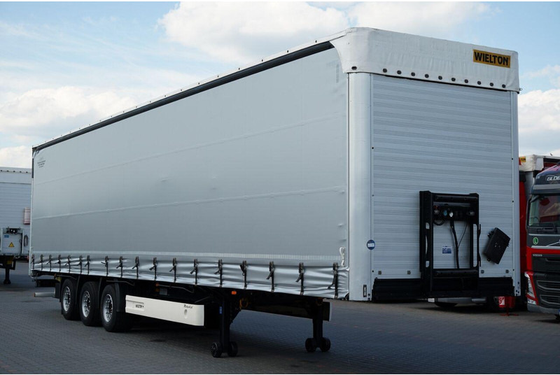 Wielton FIRANKA / MEGA / PODNOSZONY DACH / SYSTEM BDE - ROZSUWANE SŁUPKI - Тентованный полуприцеп: фото 1 Wielton FIRANKA / MEGA / PODNOSZONY DACH / SYSTEM BDE - ROZSUWANE SŁUPKI - Тентованный полуприцеп: фото 1