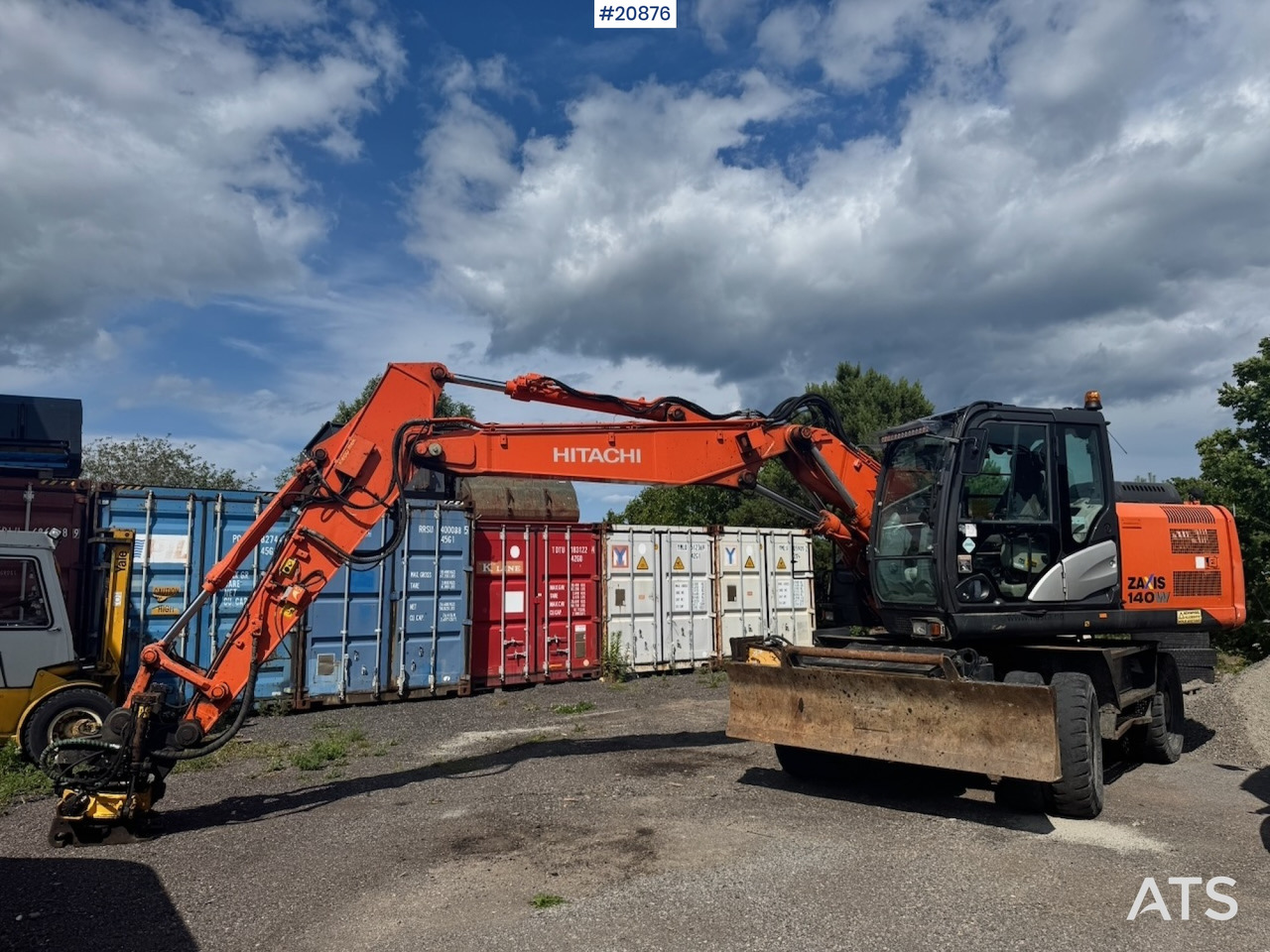 Hitachi ZX140W-5B - Колёсный экскаватор: фото 2 Hitachi ZX140W-5B - Колёсный экскаватор: фото 2