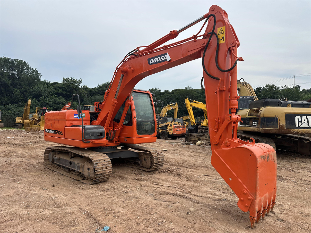 Doosan DX120 - Гусеничный экскаватор: фото 3 Doosan DX120 - Гусеничный экскаватор: фото 3
