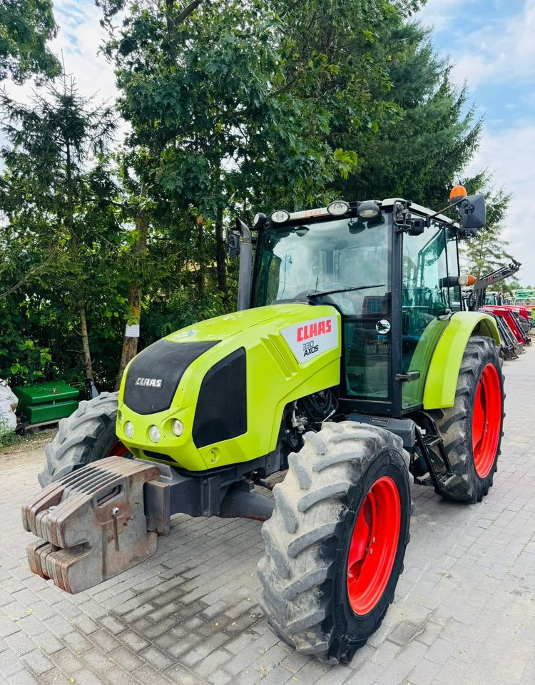 Claas Axos 330 - Трактор: фото 1 Claas Axos 330 - Трактор: фото 1