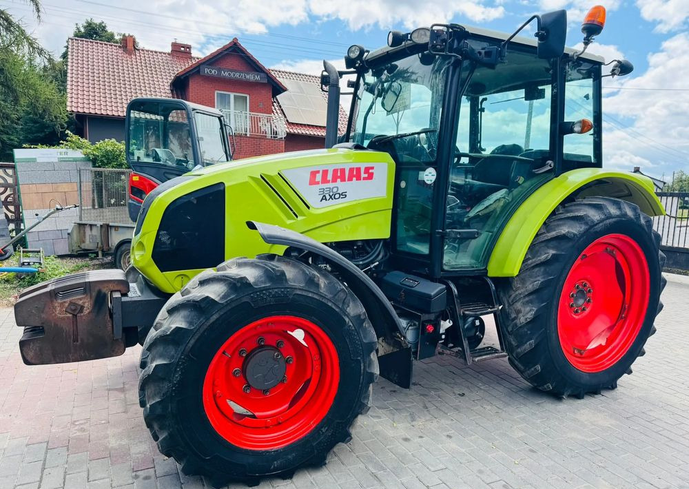 Claas Axos 330 - Трактор: фото 4 Claas Axos 330 - Трактор: фото 4