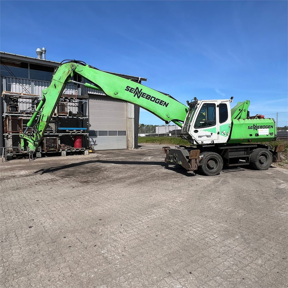 Sennebogen 818 M - Перегружатель: фото 1 Sennebogen 818 M - Перегружатель: фото 1