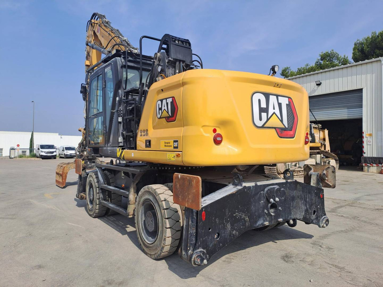 CAT MH3024 - Колёсный экскаватор: фото 2 CAT MH3024 - Колёсный экскаватор: фото 2