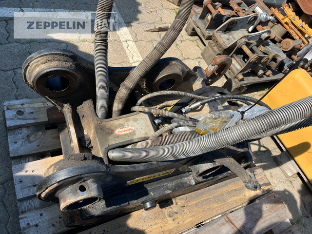 Oil-Quick OQ65 M312-M318F - Сцепное устройство для Строительной техники: фото 1 Oil-Quick OQ65 M312-M318F - Сцепное устройство для Строительной техники: фото 1